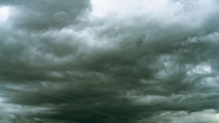 Naklejka na ściany i meble grey storm rain clouds or nimbus on sky