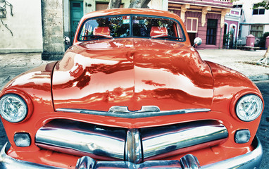 front view of old classic mercury parked in the street of havana