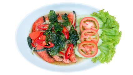 Spicy Thai style salmon salad over white background