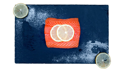 raw salmon on black plate over white background - 301300663