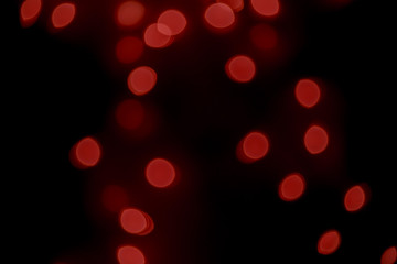 Dark Festive Christmas Beautiful abstract Background with bokeh lights. Holiday Texture with copy space. Can be used as Wallpaper, filling for a website, defocused