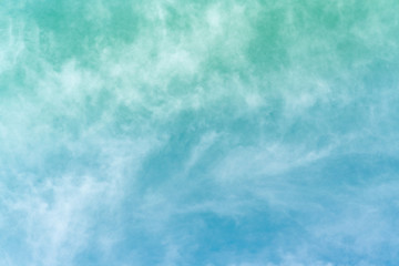 White cloud and blue sky background with copy space