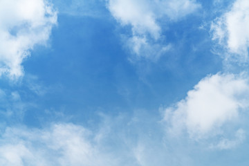 White cloud and blue sky background with copy space