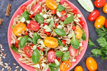 Fresh salad with wholegrain pasta and vegetables. Healthy lifestyles and nutrition