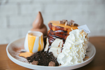 dessert on wood table in cafe