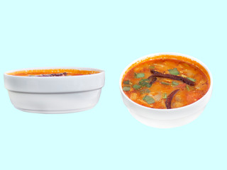 spicy lemongrass soup in a white cup  on  a blue background,many styles with clipping path