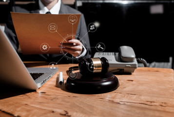 justice and law concept, Legal counsel presents to the client a signed contract with gavel and...