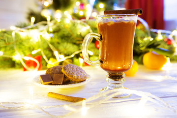 Hot chocolate with marshmallows on a background, top view, close-up Decorating and christmas tree