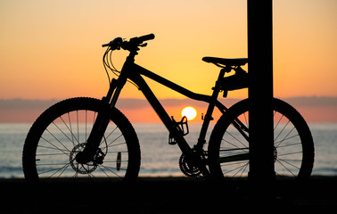 The Bike down on The Beach at Sun Rise
