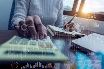 Business documents on office table with smart phone and digital tablet and graph finance with social network diagram.