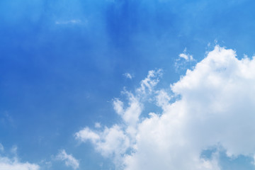 White cloud and blue sky background with copy space