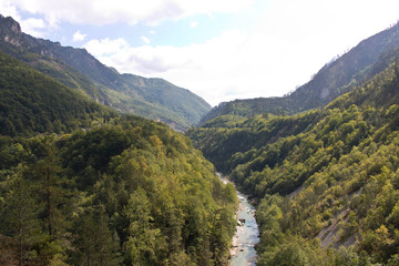 Fototapeta na wymiar Mountain river in a canyon in the mountains of Montenegro. Selective focus.