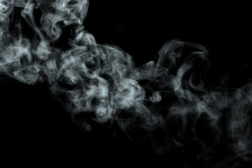 Abstract powder or smoke isolated on black background