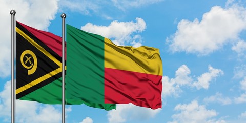 Vanuatu and Benin flag waving in the wind against white cloudy blue sky together. Diplomacy concept, international relations.