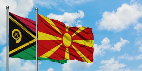 Vanuatu and Macedonia flag waving in the wind against white cloudy blue sky together. Diplomacy concept, international relations.