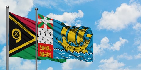 Vanuatu and Saint Pierre And Miquelon flag waving in the wind against white cloudy blue sky together. Diplomacy concept, international relations.