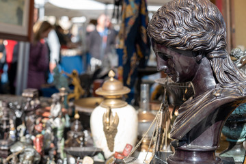Stone statuette on antique flea market in Barcelona Spain