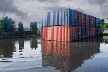 Container yard flooded, background is raining