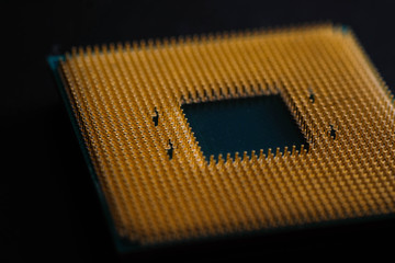 Closeup CPU pins on a green printed circuit board, Golden pins is The micro elements of computer...