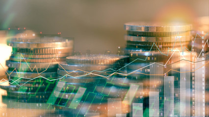 Financial investment concept, Double exposure of city night and stack of coins for finance investor, Forex trading candlestick chart, Cryptocurrency Digital economy.	