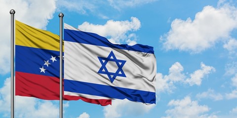 Venezuela and Israel flag waving in the wind against white cloudy blue sky together. Diplomacy concept, international relations.