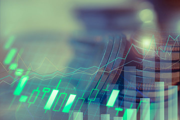 Financial investment concept, Double exposure of city night and stack of coins for finance investor, Forex trading candlestick chart, Cryptocurrency Digital economy.	