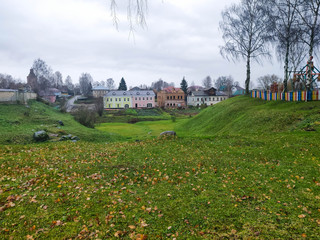 Large ravine on the edge of a childrens park and village houses