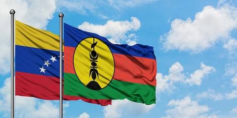 Venezuela and New Caledonia flag waving in the wind against white cloudy blue sky together. Diplomacy concept, international relations.