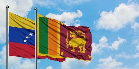 Venezuela and Sri Lanka flag waving in the wind against white cloudy blue sky together. Diplomacy concept, international relations.