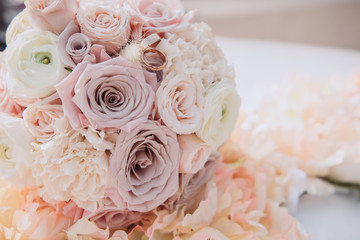 wedding bouquet and rings