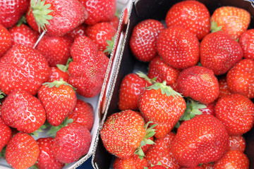 Closeup of fresh Strawberry in the box at the market.