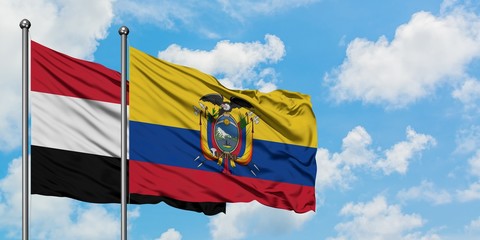 Yemen and Ecuador flag waving in the wind against white cloudy blue sky together. Diplomacy concept, international relations.