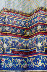 Thai Ornamental Pattern in Traditional Style is Decorated with Colorful Ceramic at Stupa of Wat Pho Monastery at Bangkok, Thailand.