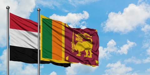 Yemen and Sri Lanka flag waving in the wind against white cloudy blue sky together. Diplomacy concept, international relations.