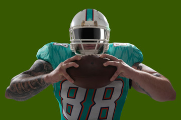 American football isolated on green screen.