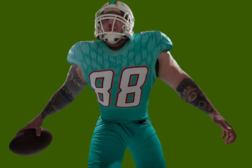 American football isolated on green screen.