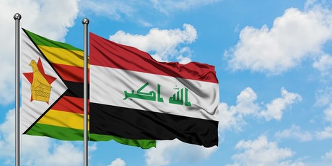 Zimbabwe and Iraq flag waving in the wind against white cloudy blue sky together. Diplomacy concept, international relations.