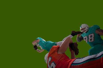 American football isolated on green screen.