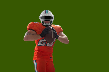 American football isolated on green screen.