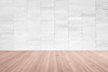 White rock tile wall with wooden floor in red brown color for interior background.