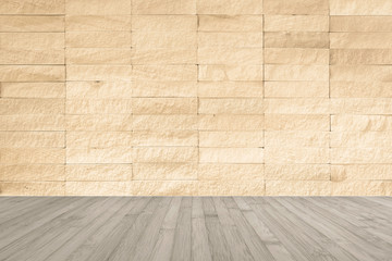 Yellow beige rock tile wall with wooden floor in light grey white for interior background...
