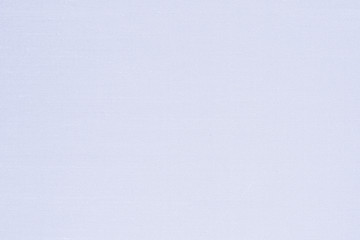 Authentic fine Thai silk fabric textile detailed texture pattern wallpaper background in light shiny magenta blue color