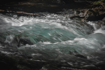 water flowing over rocks