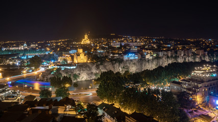 Night view of Tbilisi with Sameba (Trinity) Church and other landmarks. Beautiful Place to travel.