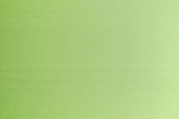 Cotton silk fabric wallpaper texture pattern background in light pastel nature green lime yellow color tone
