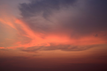 Naklejka na ściany i meble Abstract sunset cloud and colored over sky background.