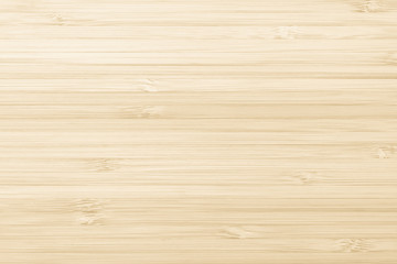 Bamboo wood texture background in natural yellow cream color.