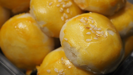 Bean cake with salted egg yolk on grey background.