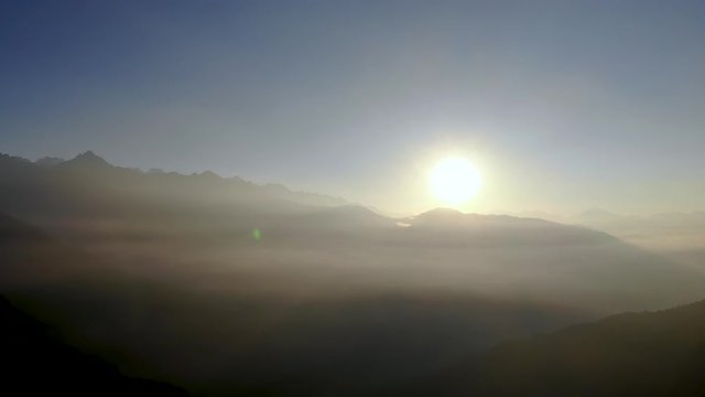 sunrise in mountains with himalayan peaks in Everest region