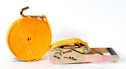 Ratchet straps for cargo load control. Cargo restraint strap